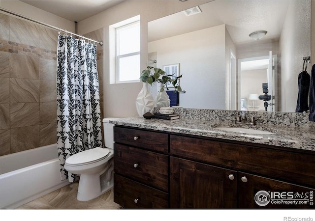 184 S 2nd Ave, Deer Trail, CO 80105 - bathroom featuring vanity, shower / bath combo, and tile patterned flooring