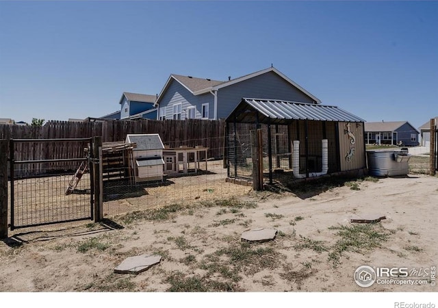 184 S 2nd Ave, Deer Trail, CO 80105 - view of yard with exterior structure and an outdoor structure