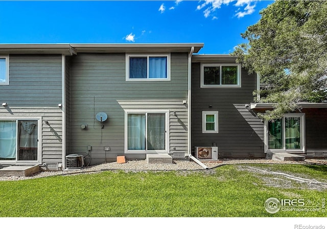 51 21st Ave Unit 43, Longmont, CO 80501 - back of house featuring a yard
