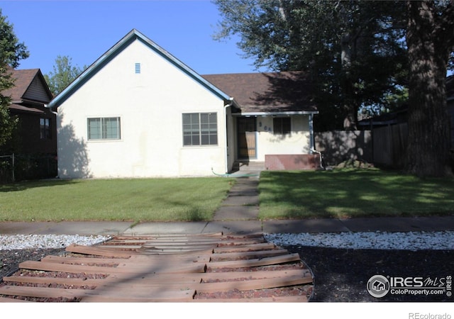 308 Prospect St, Fort Morgan, CO 80701 - view of front of home with stucco siding