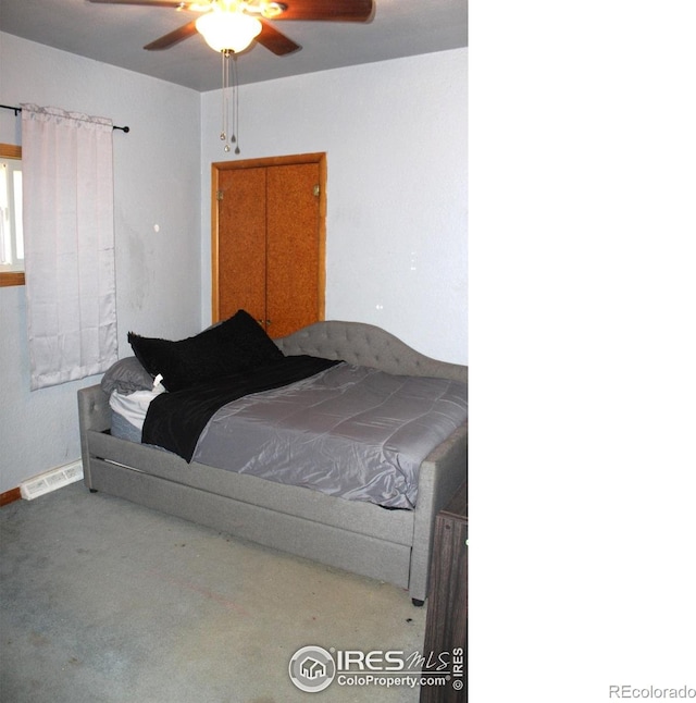308 Prospect St, Fort Morgan, CO 80701 - carpeted bedroom featuring a ceiling fan