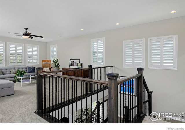 15958 Humboldt Peak Dr, Broomfield, CO 80023 - stairs with plenty of natural light, carpet flooring, a ceiling fan, and recessed lighting