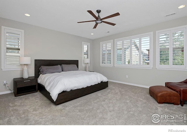 15958 Humboldt Peak Dr, Broomfield, CO 80023 - carpeted bedroom featuring multiple windows, recessed lighting, and ceiling fan