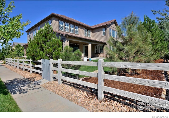 15958 Humboldt Peak Dr, Broomfield, CO 80023 - view of front of property with a fenced front yard
