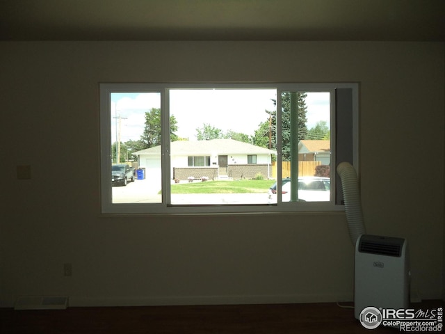 401 31st Ave, Greeley, CO 80634 - spare room with wood finished floors