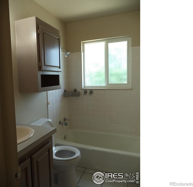 401 31st Ave, Greeley, CO 80634 - bathroom with tile patterned floors, vanity, and shower / bath combination