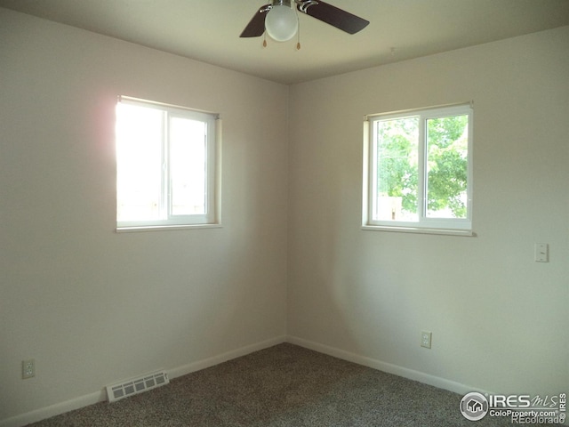 401 31st Ave, Greeley, CO 80634 - carpeted spare room with plenty of natural light and ceiling fan