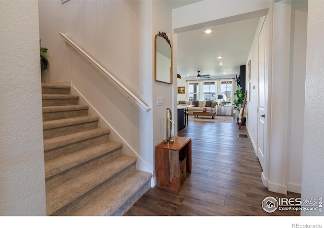 4918 Preserve Pl, Firestone, CO 80504 - stairway featuring wood finished floors, recessed lighting, and a ceiling fan