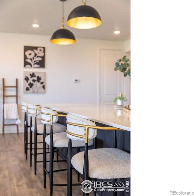 4918 Preserve Pl, Firestone, CO 80504 - dining area featuring wood finished floors and recessed lighting