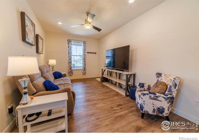 4918 Preserve Pl, Firestone, CO 80504 - living room with wood finished floors, a ceiling fan, and recessed lighting