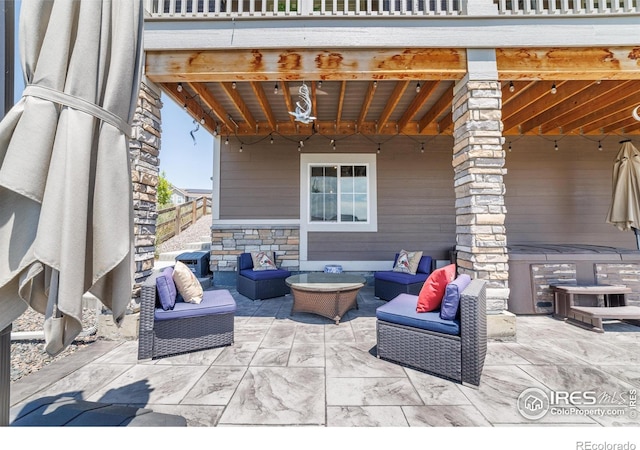 4918 Preserve Pl, Firestone, CO 80504 - view of patio featuring an outdoor hangout area and a hot tub