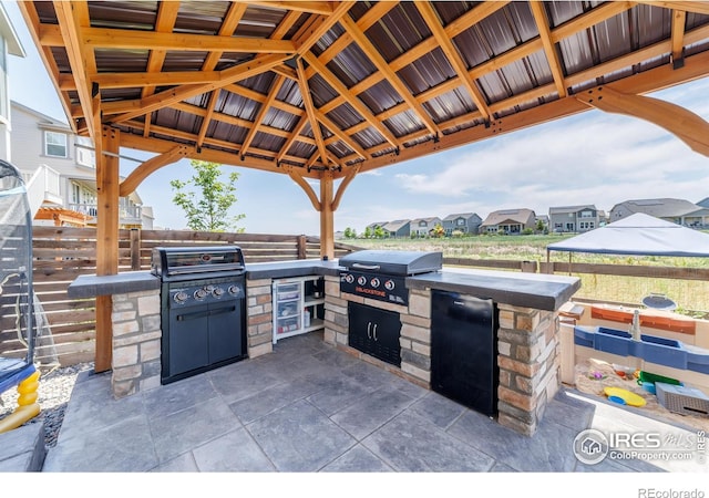 4918 Preserve Pl, Firestone, CO 80504 - view of patio featuring a gazebo and area for grilling