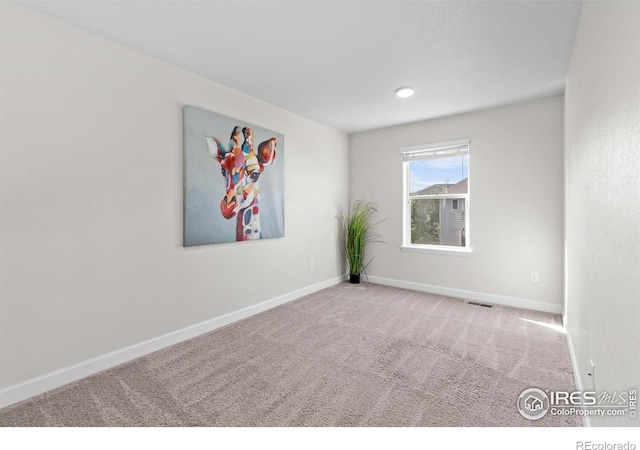 1365 15th Ave, Longmont, CO 80501 - carpeted spare room featuring baseboards and recessed lighting
