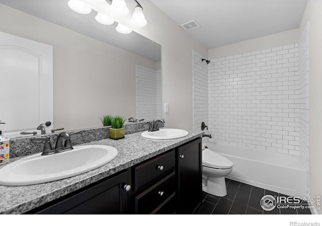 1365 15th Ave, Longmont, CO 80501 - full bathroom featuring double vanity, shower / bath combination, and tile patterned flooring