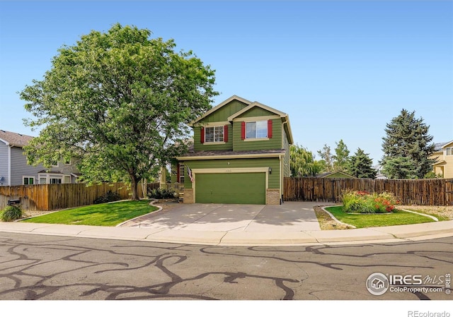 1747 Daisy Ct, Brighton, CO 80601 - view of front of house featuring brick siding, a garage, and driveway