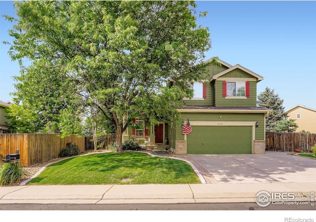 1747 Daisy Ct, Brighton, CO 80601 - view of front facade featuring brick siding, a garage, and concrete driveway