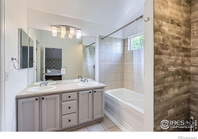 1747 Daisy Ct, Brighton, CO 80601 - ensuite bathroom featuring shower / washtub combination, tile patterned floors, and double vanity