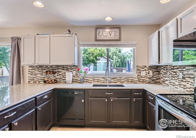 1747 Daisy Ct, Brighton, CO 80601 - kitchen with stainless steel appliances, decorative backsplash, plenty of natural light, and recessed lighting