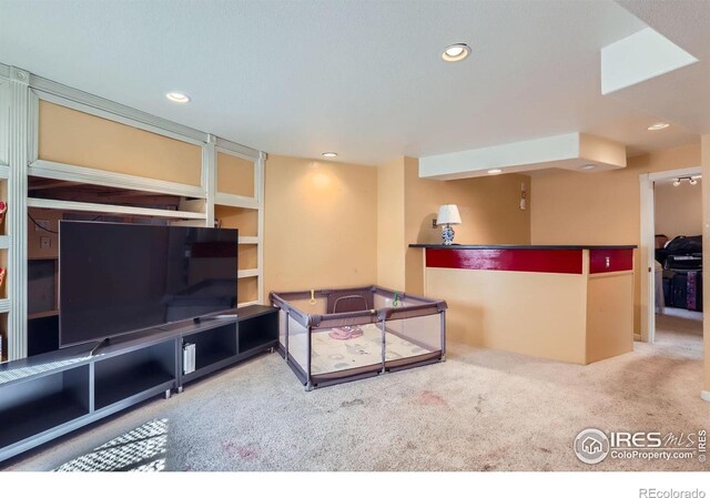 1747 Daisy Ct, Brighton, CO 80601 - carpeted living room with recessed lighting