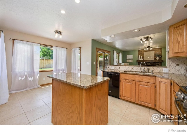 904 Pine Dr, Windsor, CO 80550 - kitchen featuring black dishwasher, a center island, light tile patterned floors, stove, and recessed lighting