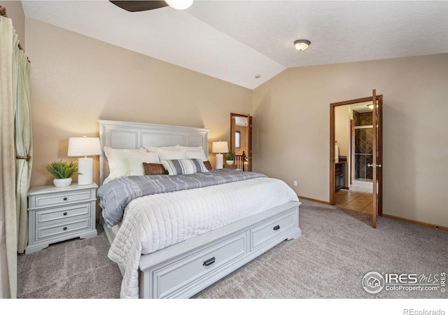 904 Pine Dr, Windsor, CO 80550 - bedroom featuring light carpet and vaulted ceiling