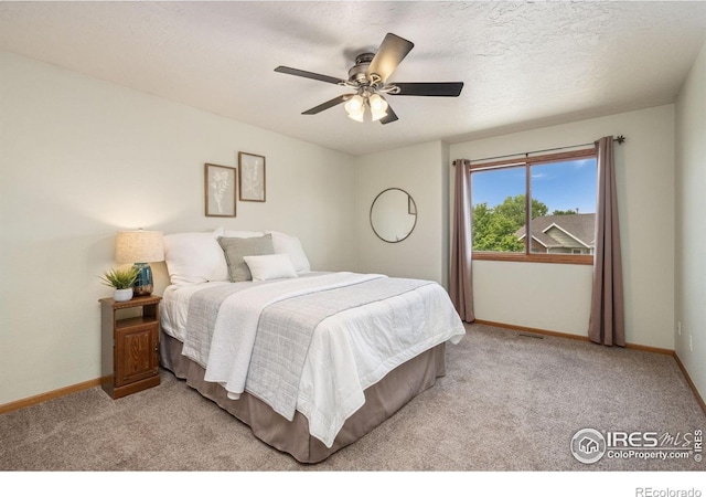 904 Pine Dr, Windsor, CO 80550 - bedroom with carpet floors and a ceiling fan