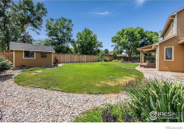 904 Pine Dr, Windsor, CO 80550 - fenced backyard featuring an outdoor structure