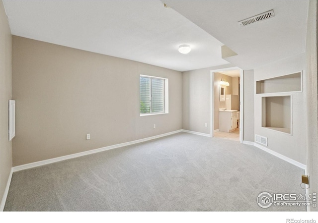 1506 Crestwood Cir, Longmont, CO 80504 - unfurnished bedroom with carpet floors and ensuite bath