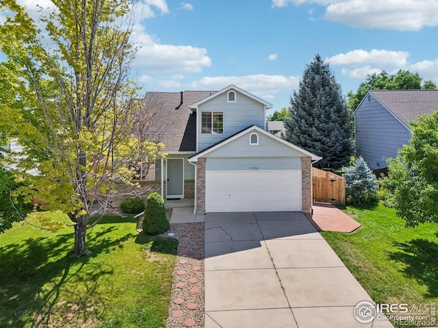 1506 Crestwood Cir, Longmont, CO 80504 - traditional-style home with driveway and brick siding