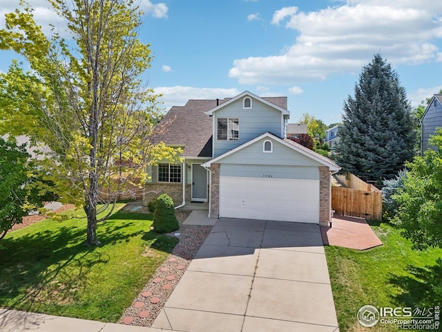 1506 Crestwood Cir, Longmont, CO 80504 - traditional-style home with brick siding, driveway, a shingled roof, and a garage