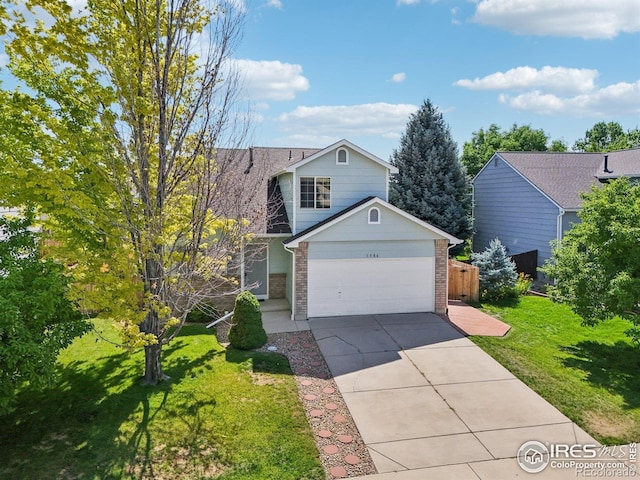 1506 Crestwood Cir, Longmont, CO 80504 - traditional-style home with brick siding, concrete driveway, and a garage