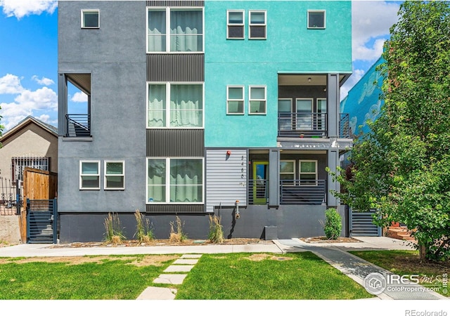 3450 N Downing St Unit 4, Denver, CO 80205 - view of front of home featuring stucco siding