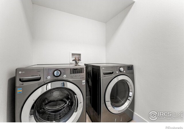 3450 N Downing St Unit 4, Denver, CO 80205 - laundry area with separate washer and dryer