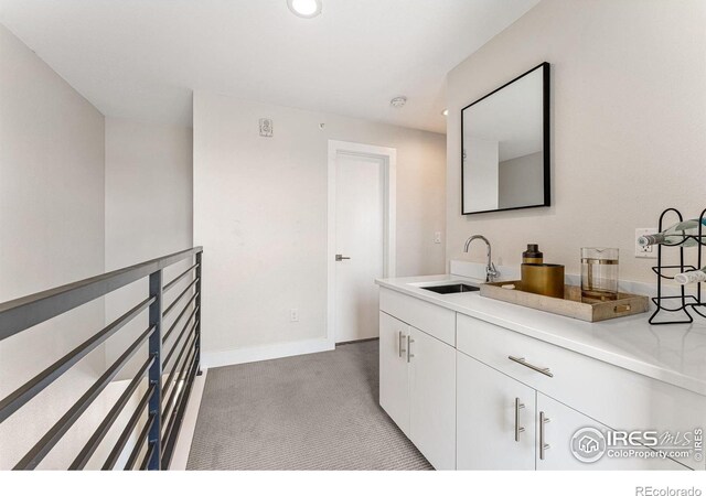 3450 N Downing St Unit 4, Denver, CO 80205 - bathroom with vanity and recessed lighting
