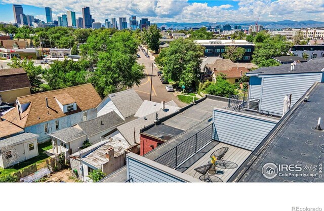 3450 N Downing St Unit 4, Denver, CO 80205 - drone / aerial view of skyline and a mountain backdrop