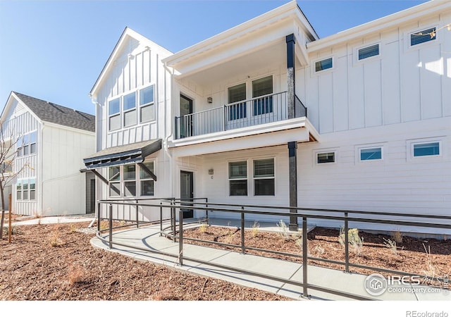 2714 Barnstormer St Unit G, Fort Collins, CO 80524 - view of front of home featuring a balcony and board and batten siding