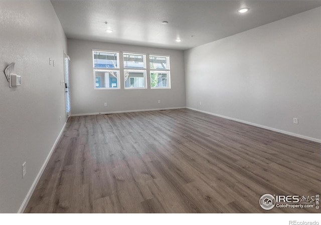 2714 Barnstormer St Unit G, Fort Collins, CO 80524 - unfurnished room with wood finished floors and recessed lighting