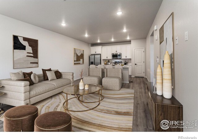 2714 Barnstormer St Unit G, Fort Collins, CO 80524 - living area featuring wood finished floors and recessed lighting