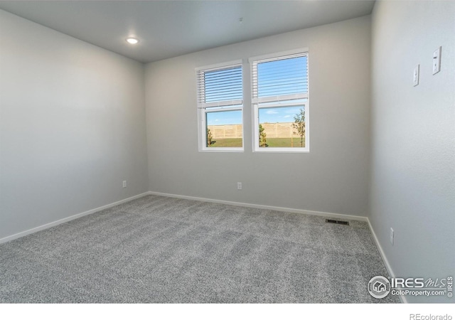 2714 Barnstormer St Unit G, Fort Collins, CO 80524 - carpeted spare room featuring baseboards