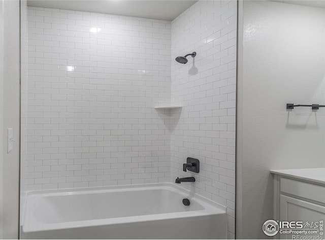 2714 Barnstormer St Unit G, Fort Collins, CO 80524 - bathroom featuring washtub / shower combination and vanity