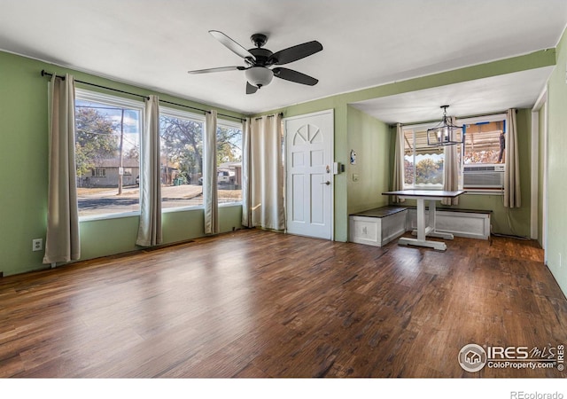 1109 Ironton St, Aurora, CO 80010 - spare room with wood finished floors, a chandelier, a ceiling fan, and cooling unit