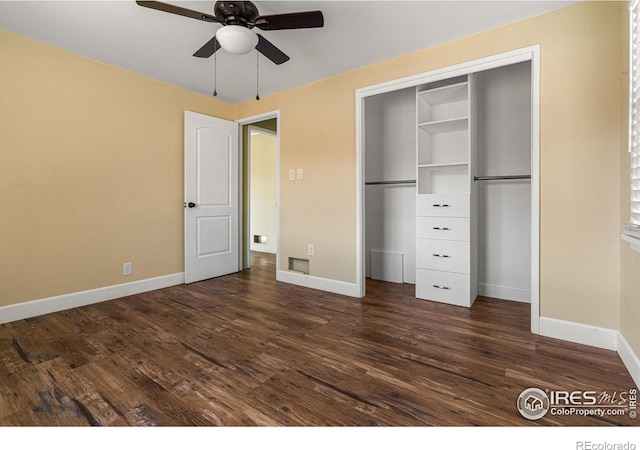 1109 Ironton St, Aurora, CO 80010 - unfurnished bedroom featuring dark wood-style floors, a closet, and a ceiling fan