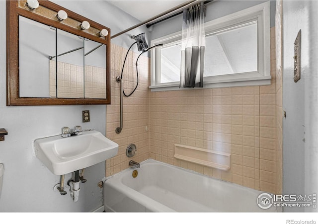 1109 Ironton St, Aurora, CO 80010 - bathroom with bathing tub / shower combination and a sink