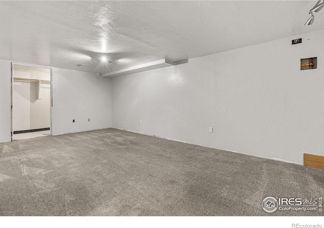 1109 Ironton St, Aurora, CO 80010 - empty room featuring carpet floors and a textured ceiling