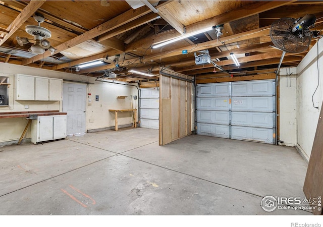 1109 Ironton St, Aurora, CO 80010 - garage featuring a garage door opener