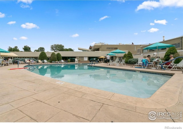 1109 Ironton St, Aurora, CO 80010 - community pool featuring a patio