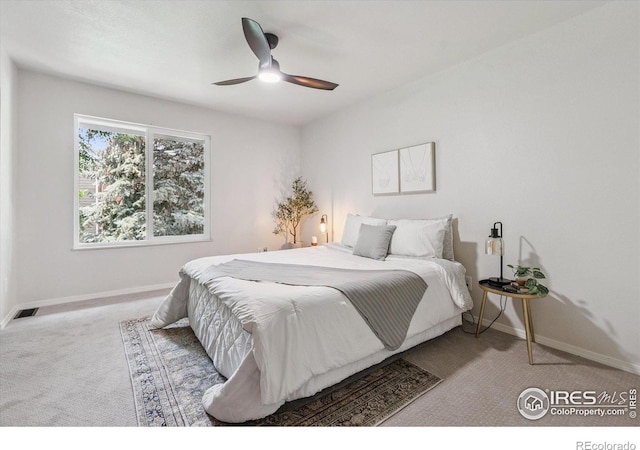 7474 E Arkansas Ave Unit 12, Denver, CO 80231 - bedroom with carpet and ceiling fan
