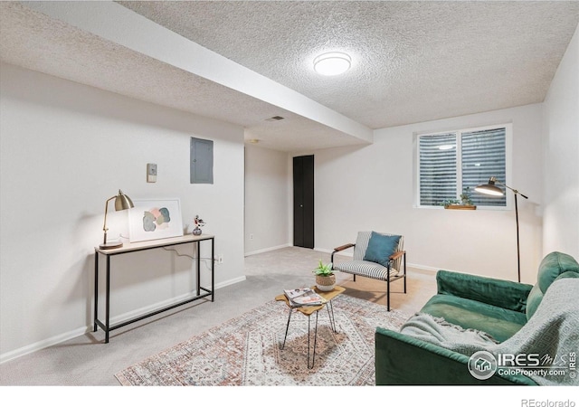 7474 E Arkansas Ave Unit 12, Denver, CO 80231 - sitting room featuring carpet floors, a textured ceiling, and electric panel