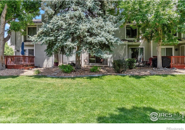 7474 E Arkansas Ave Unit 12, Denver, CO 80231 - view of front of property with a front yard and a deck