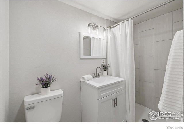 7474 E Arkansas Ave Unit 12, Denver, CO 80231 - full bath featuring vanity and tiled shower